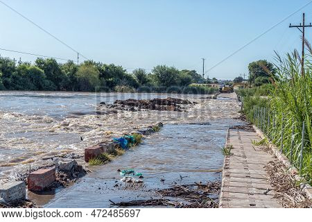 Kanoneiland, South Africa - Feb 25, 2023: The Flooded Orange River Flowing Over Eendrag Bridge At Ko