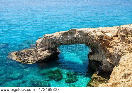 Love Bridge Near Ayia Napa In Cyprus. Natural Rock Arch Formation Known As Bridge Of Lovers At Cape 