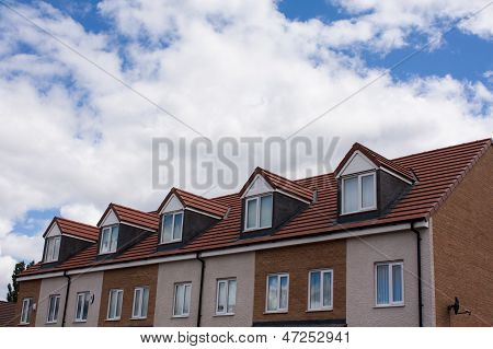 Gable Dormers And Roof Of Residential House
