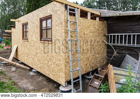 Construction Of A Wooden Garden House