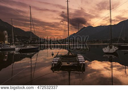 Colourful Yachts Docked At Marina Of Lecco Town On Spring Sunset. Picturesque Waterfront Of Lecco Lo