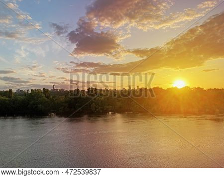 Historical Sights Of Ukraine. Beautiful Scenic View Of Kyiv. Sunset Over The Dnieper River In Kiev. 