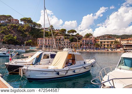 Porto Azzurro Island Of Elba Italy - 19 September 2021 Cityscape Of Harbor Of Porto Azzurro