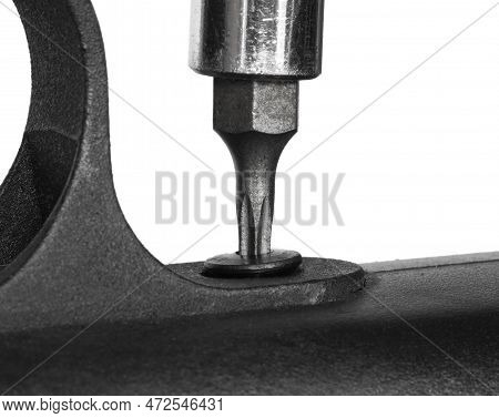 Star Headed Screwdriver Removing A Trigger Guard On A Rifle