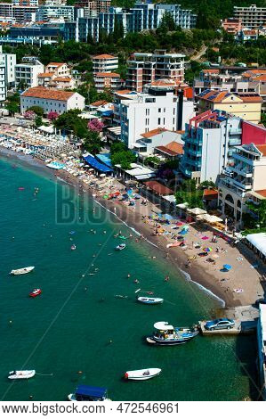 Panorama Of The Beach And The Resort Towns Of Becici And Rafailovici, Located At The Foot Of The Mou