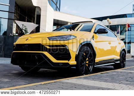 Minsk, Belarus, March 2023 - Yellow Lamborghini Urus.  Luxury Italian Suv. Super Car