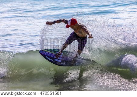 Playa Del Carmen, Mexico - March 12, 2023: Incredible Picture Of A Person Surfing The Waves Of The C