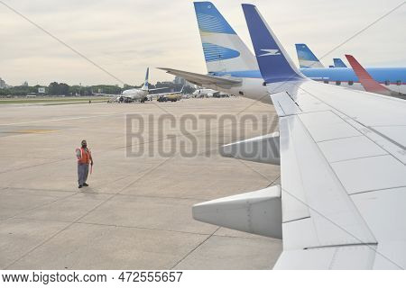 Buenos Aires, Argentina, November 18, 2022: Aviation Marshaller View From A Window Of A Boeing 737-7