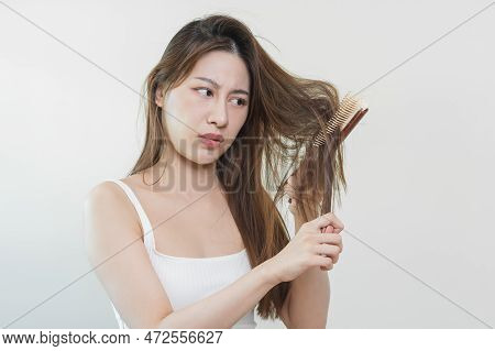 Damaged Hair, Frustrated Asian Young Woman, Girl Hand In Holding Brush Splitting Ends Messy While Co
