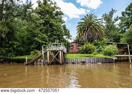 Boat Tour On The Parana Delta, Tigre, Buenos Aires, Argentina. Lush Vegetation, Palm Trees, Construc