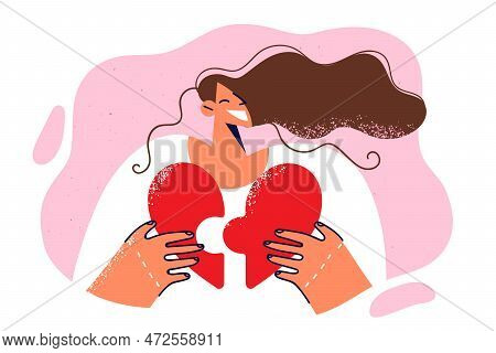 Happy Girl Holding Heart Shaped Puzzle And Smiling Broadly While Doing Pandering Loving People Or Ar