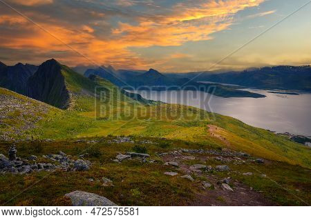 View From The Husfjellet Mountain On Senja Island In Northern Norway At Sunset Over Surrounding Fjor