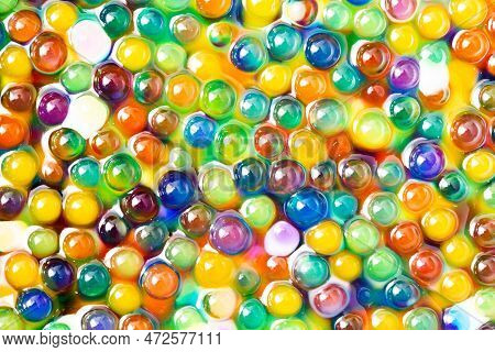 Hydrogel Balls Texture. Absorbent Gel Pattern. Wet Small Beads. Shiny Funny Game For Children Backgr