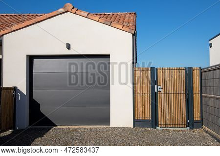 Modern Home Gray Split Sequential Gate Garage Portal Grey Facade Of House Suburb With Wooden Door Ac