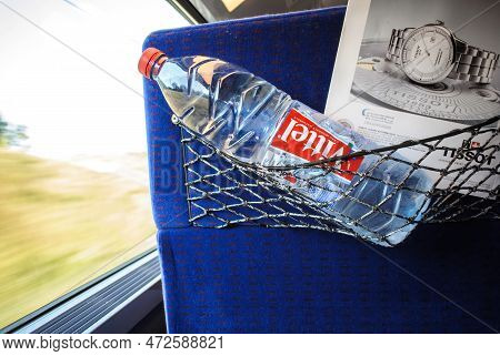 Switzerland - Jul 17, 2014: Interior Of A Fast Motion Train With Front Passeger Seat Holding Vittel 