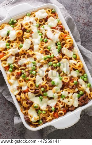 Anelli Al Forno Pasta Baked With Mince, Vegetable And Cheese Closeup In A Baking Dish On The Table. 