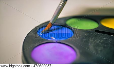 Palette With Colored Oil Paints. Color Palette Close-up. Aesthetic Taste. Pastel Tones. Color Sample