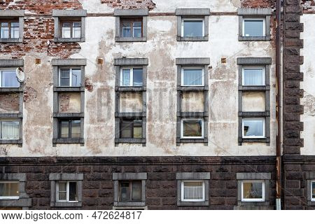 A Fragment Of The Glass And Sandstone Facade Of A Modern Office Building. Wide Abstract Fragment Of 