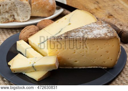 Cheese Collection, French Cheeses Morbier Semi-soft Cow Milk Cheese With Black Mold Layer And Tomme 