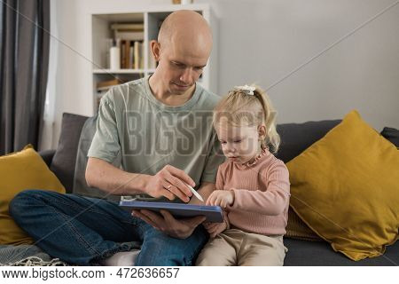 Deaf Child Girl With Cochlear Implant Studying To Hear Sounds And Have Fun With Father - Recovery Af