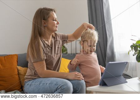 Deaf Child Girl With Cochlear Implant Studying To Hear Sounds And Have Fun With Mother - Recovery Af