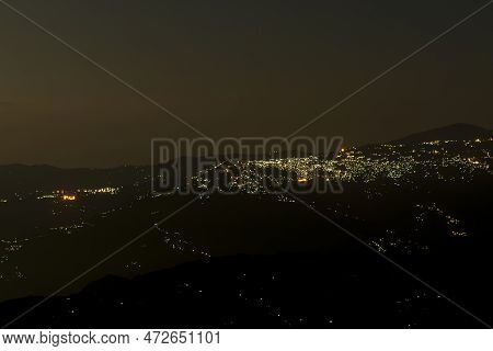 Pearls Of Light Of Queen Of Hills, Darjeeling Town, At Night. In The Eastern Himalayas, To The West 