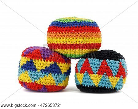 Three Multicolored Crocheted Hacky Sack Balls Isolated On A White Background