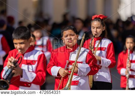 Matamoros, Tamaulipas, Mexico - November 26, 2022: The Desfile Del 20 De Noviembre, Marching Band Pe