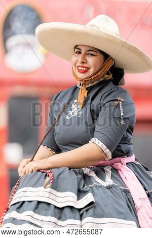 Matamoros, Tamaulipas, Mexico - September 16, 2022: Desfile 16 De Septiembre, Young Woman Wearing Tr