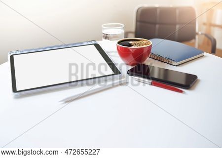 Desk Work Coffee Cup With Smart Phone And Tablet Computer, Notebook, Pen On White Table, Freelance W