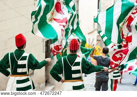 Siena, Italy - July 2013: The Noble Contrada Dell'oca On The Corteo Storico, A Historical Costume Pa