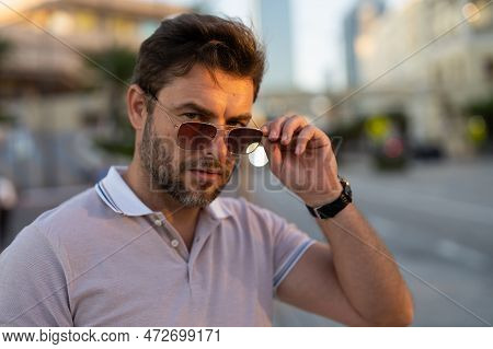 Urban Style Guy With Casual Clothes Walk In Tampa City. Portrait Of Attractive Man With Casual Cloth
