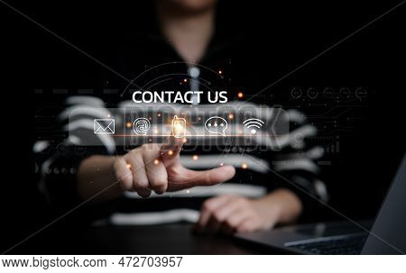Woman Using A Laptop And Touching On Virtual Screen Contact Icons Consists Of Telephone, Email, Addr