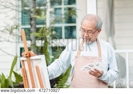 Asian Caregiver Helping Senior Male From Falling On The Ground. Older Elderly Man Patient Having Acc