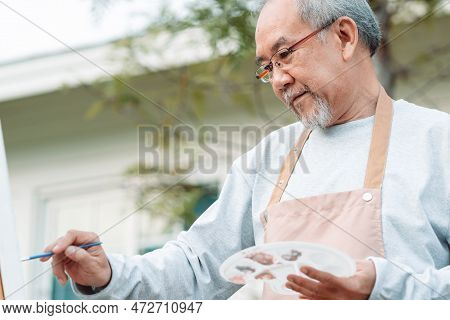 Asian Caregiver Helping Senior Male From Falling On The Ground. Older Elderly Man Patient Having Acc