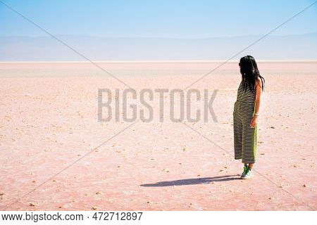 Aerial View Young Caucasian Woman Alone Walk And Explore Maharlu Salt Lake In South Iran, Shiraz