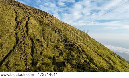 Aerial View Of Mount Sindoro In Indonesia With Noise Cloud. High Quality Photo. Selective Focus. Jav