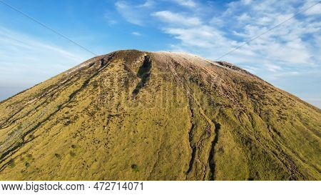 Aerial View Of Mount Sindoro In Indonesia With Noise Cloud. High Quality Photo. Selective Focus. Jav