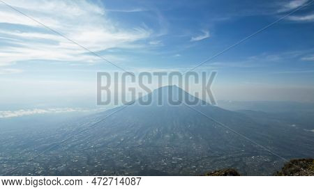 Aerial View Of Mount Sumbing In Indonesia With Noise Cloud. High Quality Photo. Selective Focus. Jav