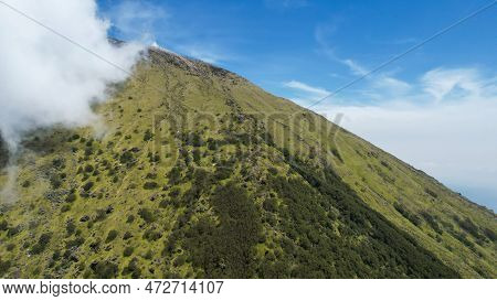 Aerial View Of Mount Sindoro In Indonesia With Noise Cloud. High Quality Photo. Selective Focus. Jav
