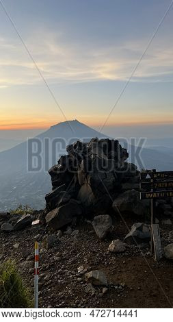 Mountains Under Mist In The Morning In Sindoro Mountain County. West Java, Indonesia, March 16, 2023