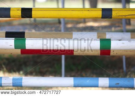Show Jumping Poles Obstacles, Barriers, Waiting For Riders On Show Jumping Training. Horse Obstacle 