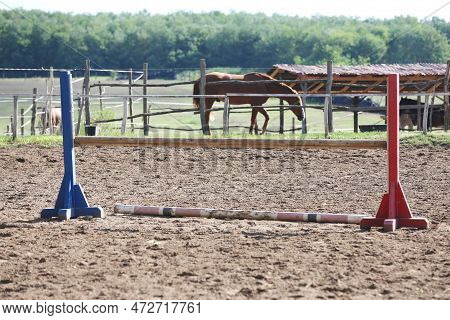 Show Jumping Poles Obstacles, Barriers, Waiting For Riders On Show Jumping Training. Horse Obstacle 