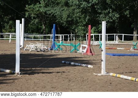 Show Jumping Poles Obstacles, Barriers, Waiting For Riders On Show Jumping Training. Horse Obstacle 
