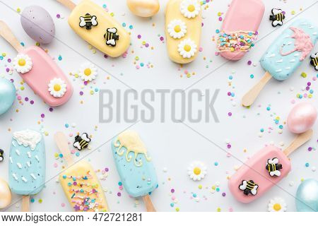 Homemade Spring Time Cakesicles In A Border With Copy Space In The Middle.