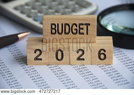 Budget 2026 Text On Wooden Blocks With Data Analysis And Office Concept Background. Budgeting Concep