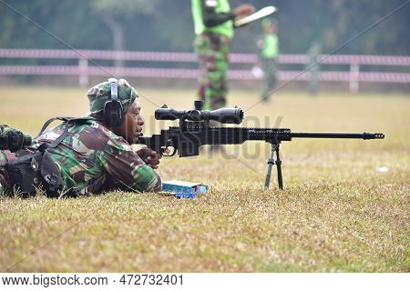 Jakarta, Indonesia - June 26, 2018: Soldiers Aiming At Targets Using Spr-4 Guns