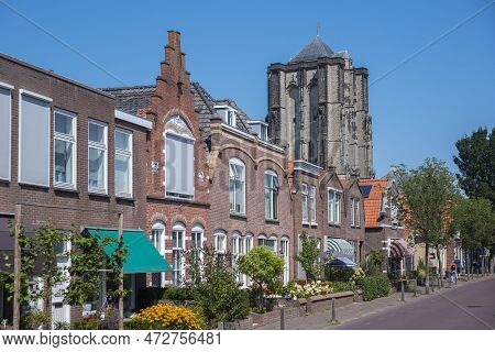 House Facades In The Weststraat With Sint Lievensmonstertoren, Tower Of The Sint Lievens Minster In 
