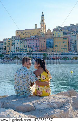 Menton France, Couple Men And Woman On Vacation At The Cote D Azur France, View On Old Part Of Mento