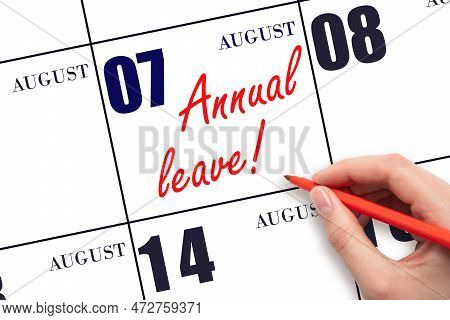 7th Day Of August. Hand Writing The Text Annual Leave And Drawing The Sun On The Calendar Date Augus